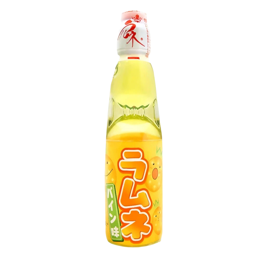 A bottle of Hatakosen Ramune Pineapple Soda with Japanese text on the label, containing 200ml of the beverage.
